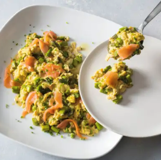 Scrambled eggs with asparagus, smoked salmon, and chives