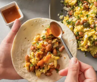 Scrambled eggs with pinto beans and cotija cheese