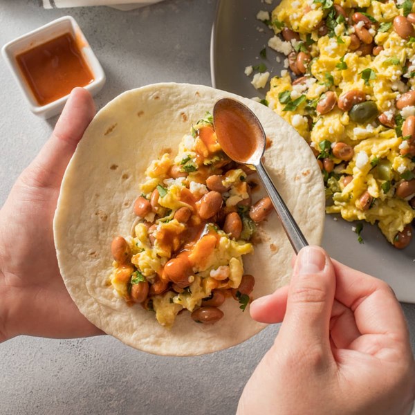 Scrambled eggs with pinto beans and cotija cheese
