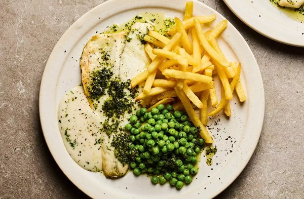 Sea bass & frites with pesto peas and Hollandaise