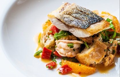 Sea bass and tiger prawn panzanella-style salad with chilli dressing