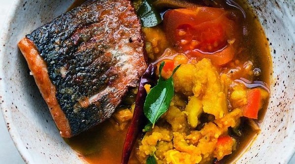 Sea bass and turmeric potatoes in rasam broth