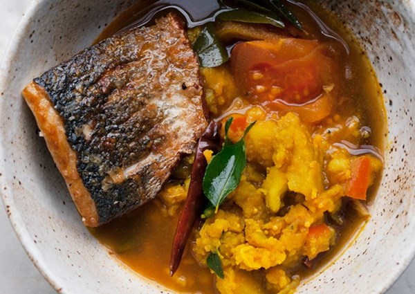 Sea bass and turmeric potatoes in rasam broth
