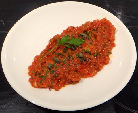 Sea bass poached with fresh tomatoes (Branzino al pomodoro fresco)