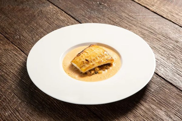 Sea bass, smoked Espelette butter sauce, coco bean cassoulet