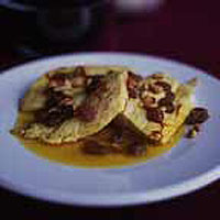 Sea bass with saffron, sherry and pine nuts