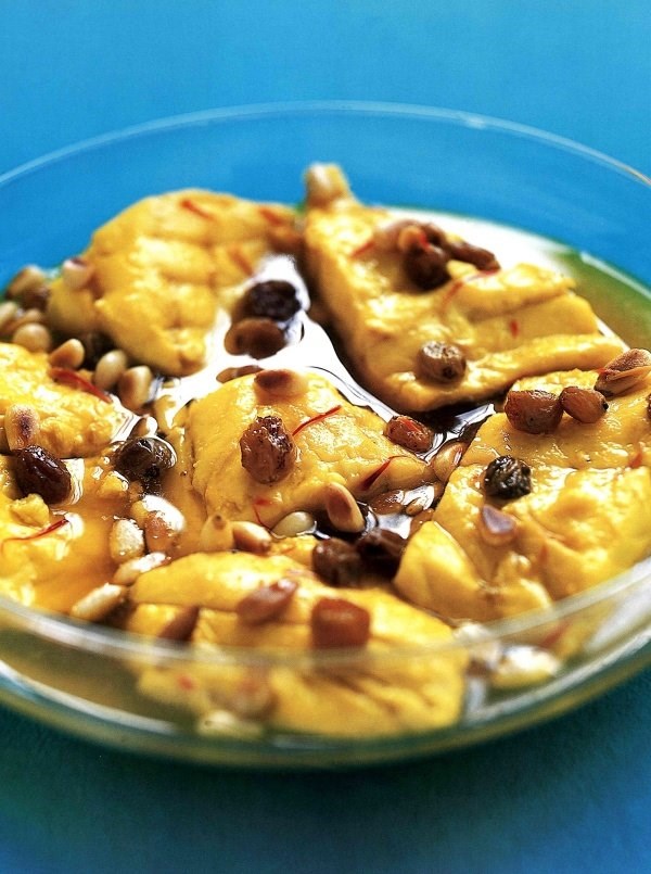 Sea bass with saffron, sherry and pinenuts