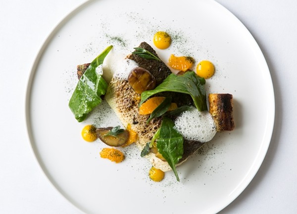 Sea bass with seaweed dumplings, clementine and lemon foam