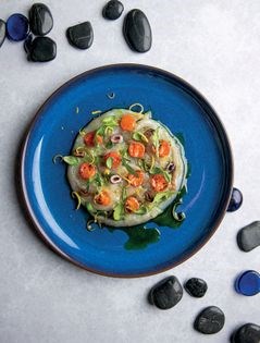 Sea bream carpaccio, roast tomatoes, and olives (Carpaccio di orata, pomodorini e olive taggiasche)