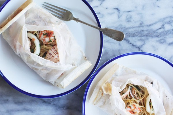 Seafood spaghetti baked in paper (Spaghetti al cartoccio)