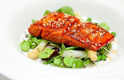 Seared Alaska salmon with maple syrup, lime and soy glaze spring vegetable salad with toasted sesame