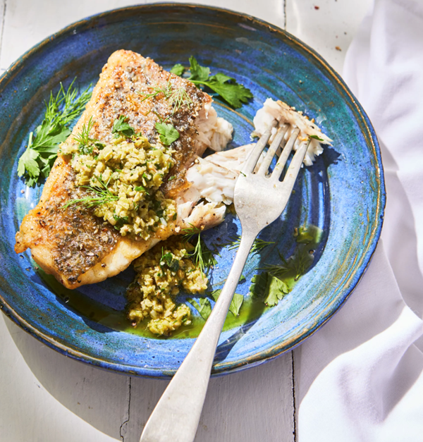 Seared barramundi with olive-herb sauce