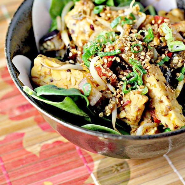 Seared bean sprouts with tempeh and sesame orange sauce