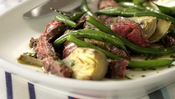 Seared beef skirt with grilled artichokes, lemon and oregano