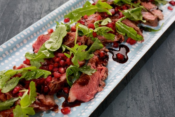 Seared beef with pomegranate and balsamic dressing
