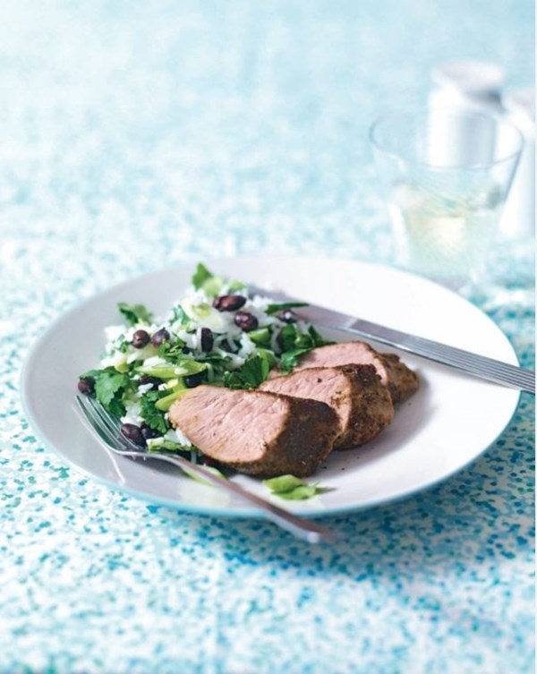 Seared Cajun-style pork with coconut rice and beans