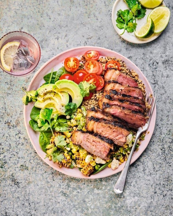 Seared chipotle steak bowls with charred corn salad