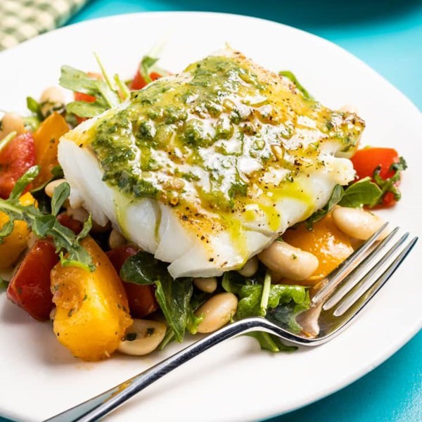 Seared cod with white bean, tomato, and arugula salad