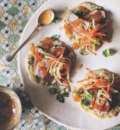 Seared duck breast on green onion pancakes with daikon salad