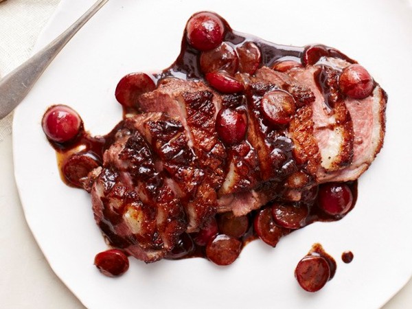Seared duck breast with garam masala and grapes