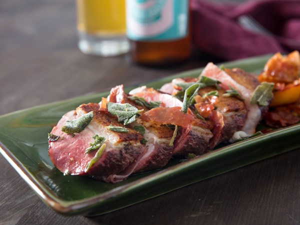 Seared duck breast with prosciutto, sage, and peaches