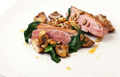 Seared duck breast with sautéed and pickled mushrooms, pumpkin seeds and toasted peanuts