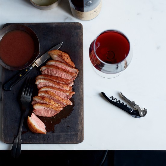 Seared duck with date jus and piave foam