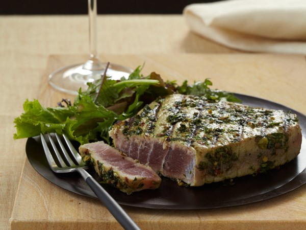 Seared encrusted tuna steak with cilantro and basil