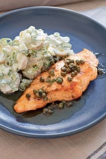 Seared escalope of salmon with a potato & spring onion salad, capers & brown butter