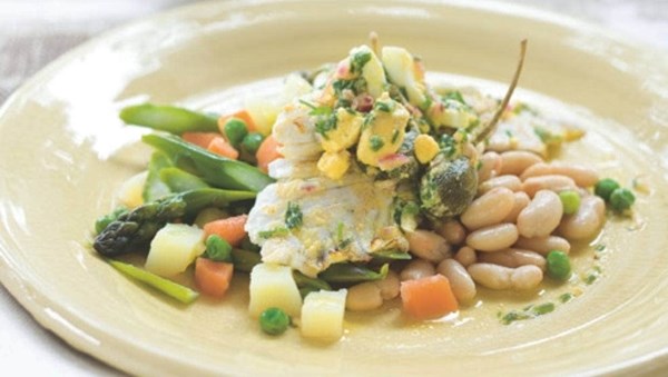 Seared fish with white beans, steamed vegetables and boiled egg vinaigrette