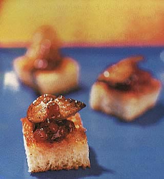 Seared foie gras and lingonberry jam on brioche toasts
