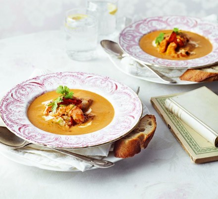Seared garlic seafood with spicy harissa bisque