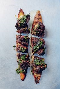 Seared morcilla with roasted apple, rosemary & black pepper mostarda & chimichurri on toasted baguette