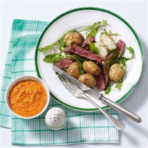 Seared paprika beef salad with smoky romesco sauce
