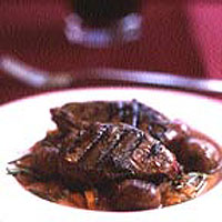 Seared pigeon breasts in sweet wine, with rosemary-infused chestnuts