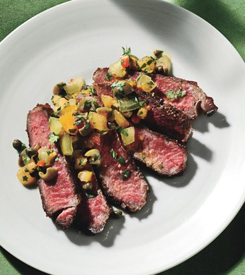 Seared rib-eye steak with tomato-caper relish