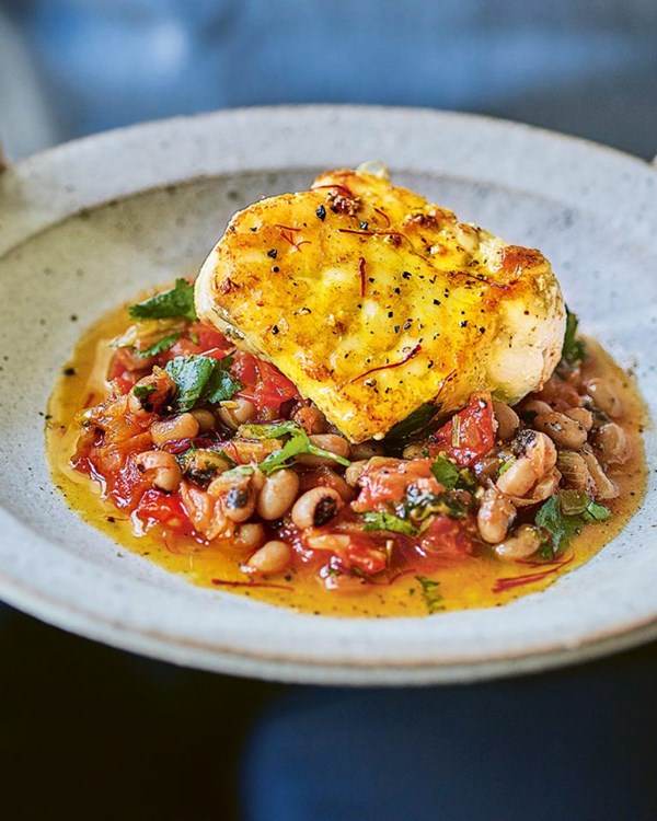 Seared saffron monkfish with black-eyed beans