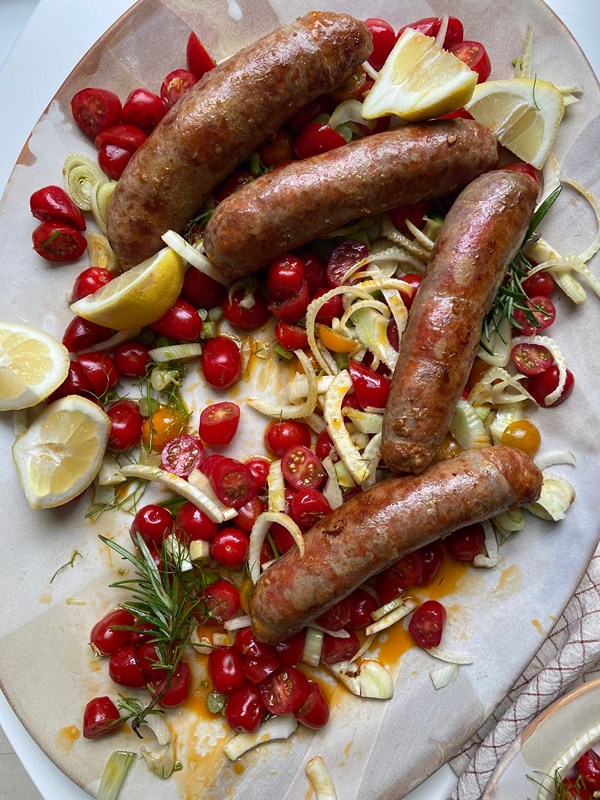 Seared sausages with fresh tomatoes