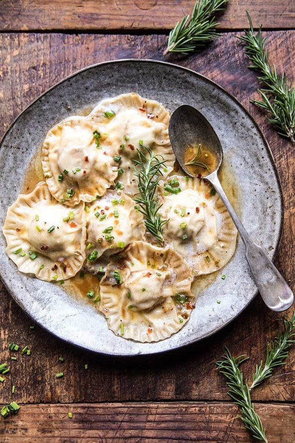 Seared scallop ravioli with rosemary butter and lemon sauce