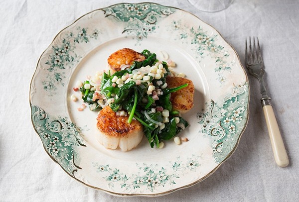 Seared scallops with corn, spinach, and bacon
