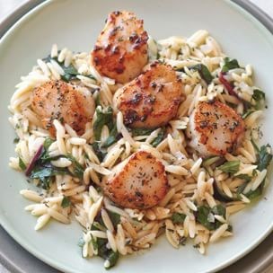 Seared scallops with greens and orzo