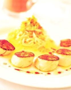 Seared scallops with home-made pasta, spring onions and Maltaise sauce