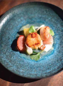 Seared scallops with Meyer lemon tiger's milk, grapefruit, and fermented sunchokes