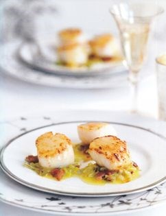 Seared scallops with smoky leeks and orange butter