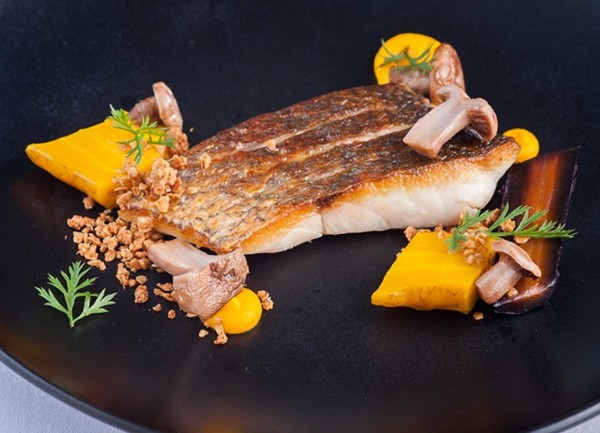 Seared sea bass with salt-baked heritage carrots