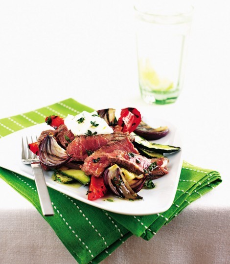 Seared steak on Mediterranean vegetables with a garlic yoghurt dressing