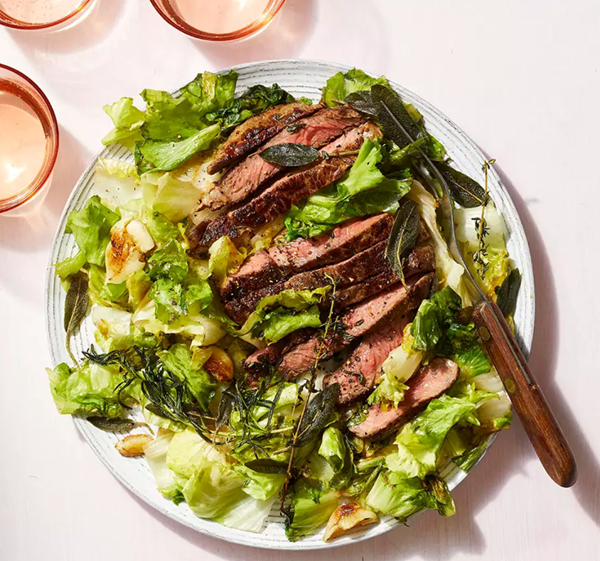 Seared steak with crispy herbs & escarole
