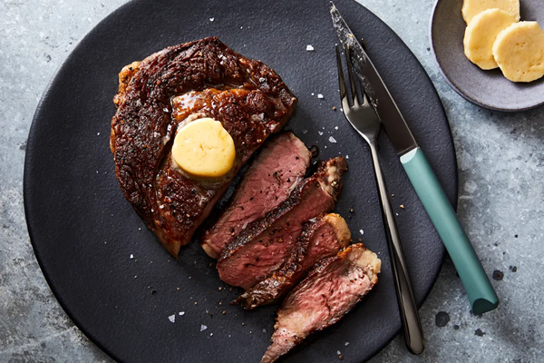 Seared steak with maple compound butter