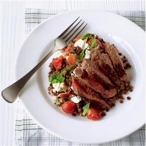 Seared steak with sun-dried tomato and basil Puy lentil