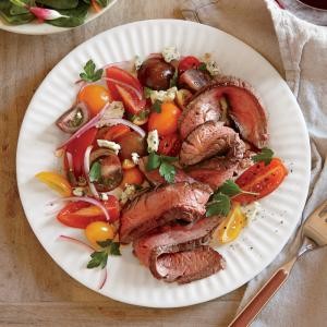 Seared steak with tomato and blue cheese salad